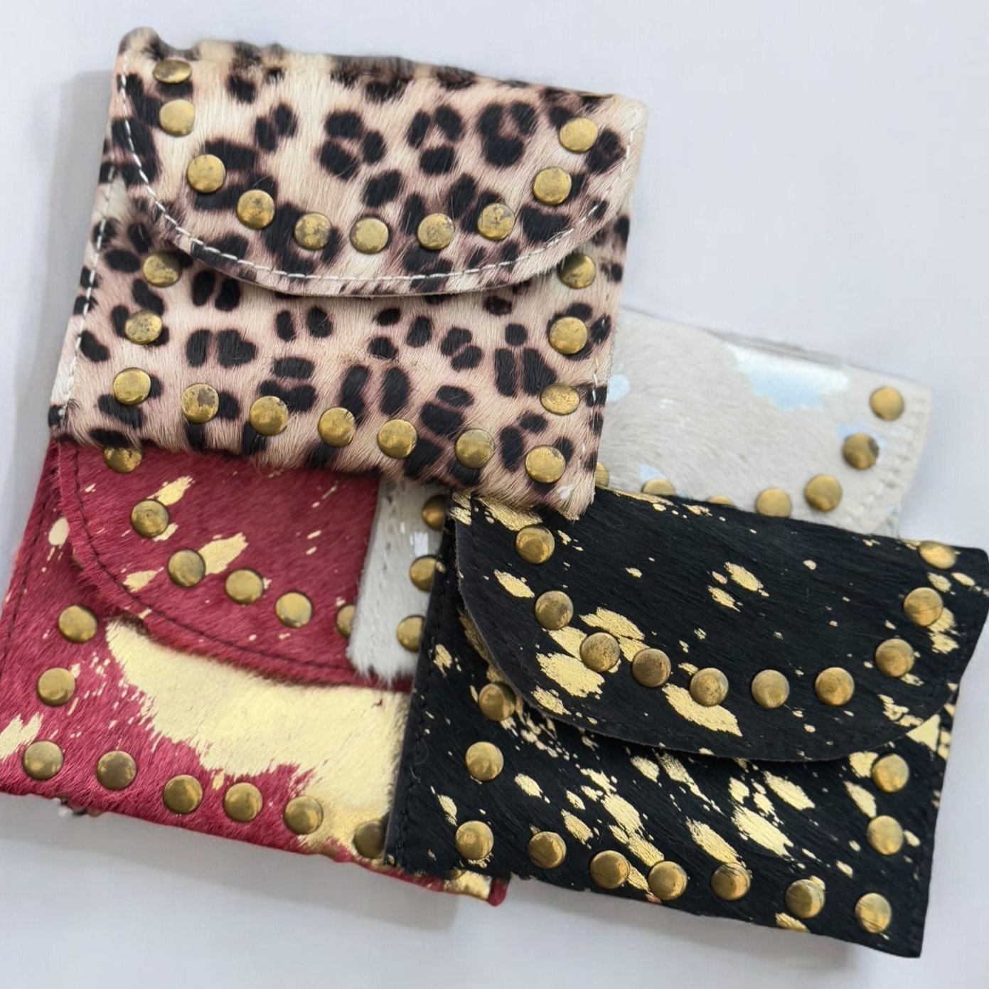 MONEDERO PIEL Y PELO TACHAS